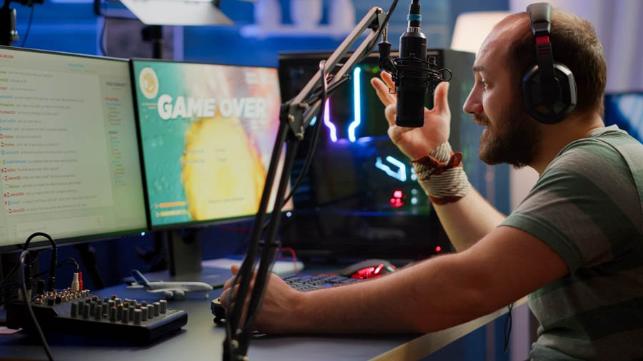 Image of a streamer talking into the microphone.