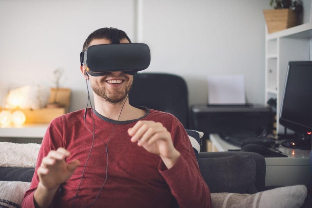 a picture of a player with a VR Headset on his head