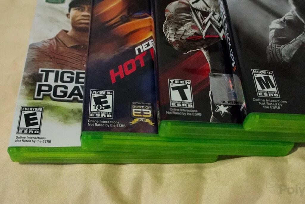 an image of different Xbox Game boxes like WWE, COD: BO 2, NFS: Hot Pursuit