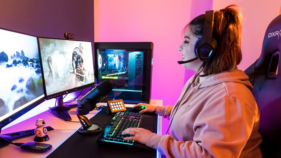 an image of a female gamer behind her computer
