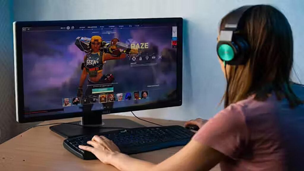 a picture of a female gamer playing Valorant